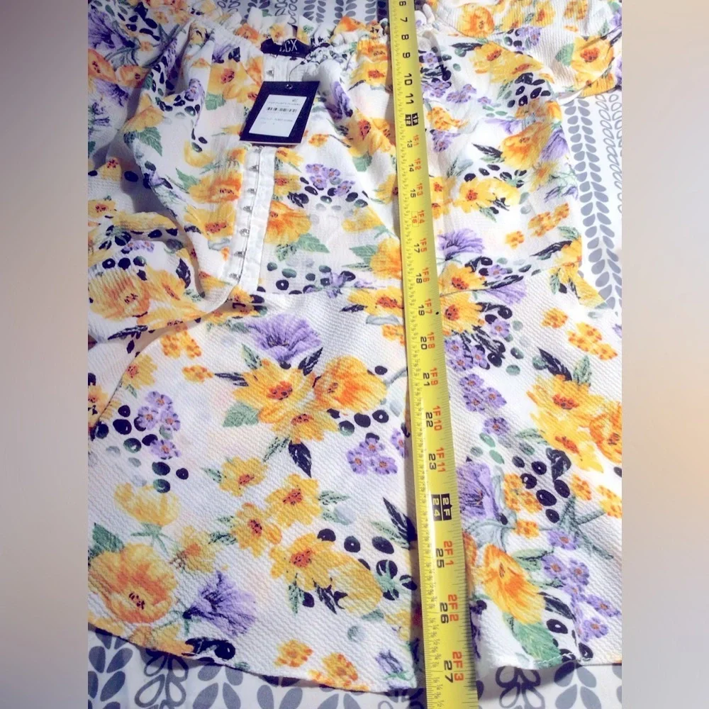 NEWT CITY CHIC PEPLUM FLORAL TOP. - Picture 4 of 11